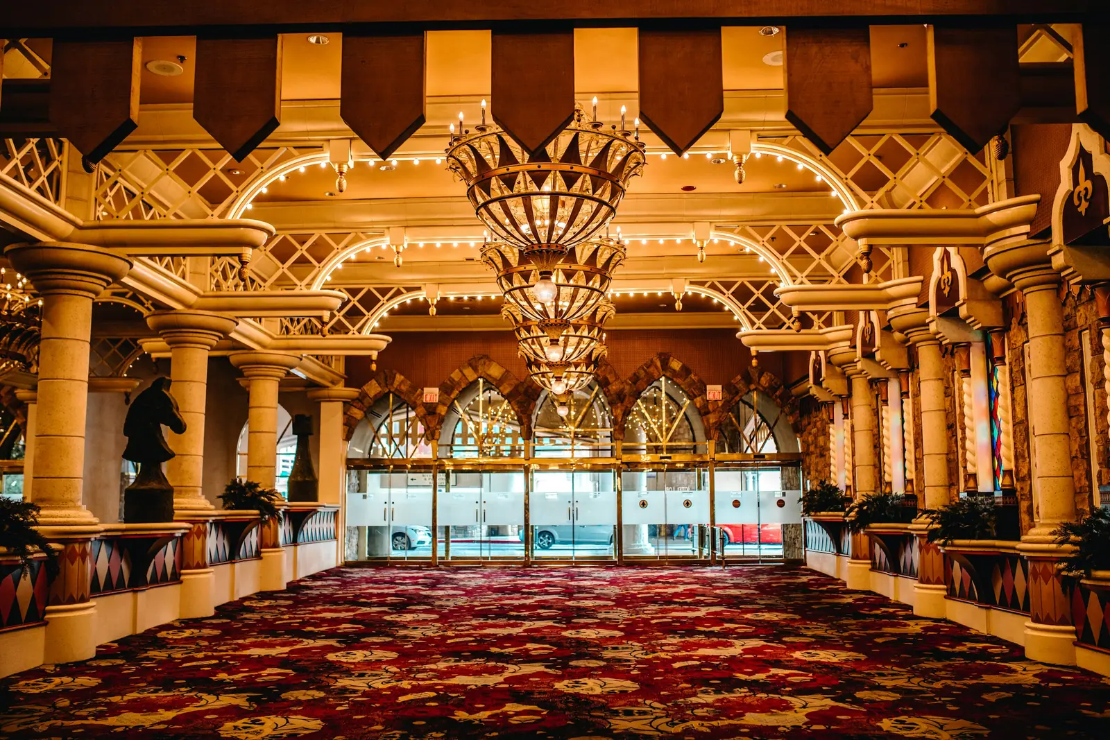 Durbar Hall with gilded ceiling and chandeliers set for a reception