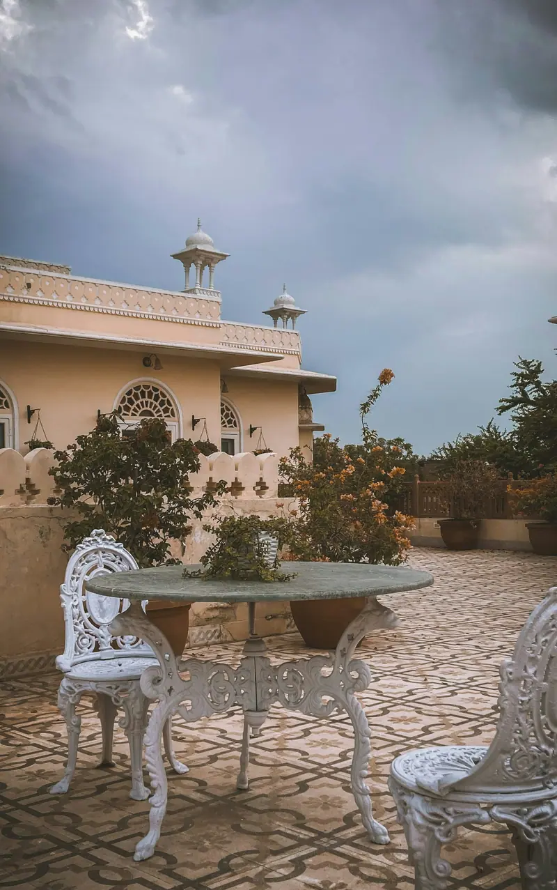 Palace courtyard with fountain and white pavilions